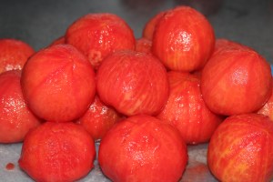 After the 60 second boil and ice water bath, they peel quite easily.